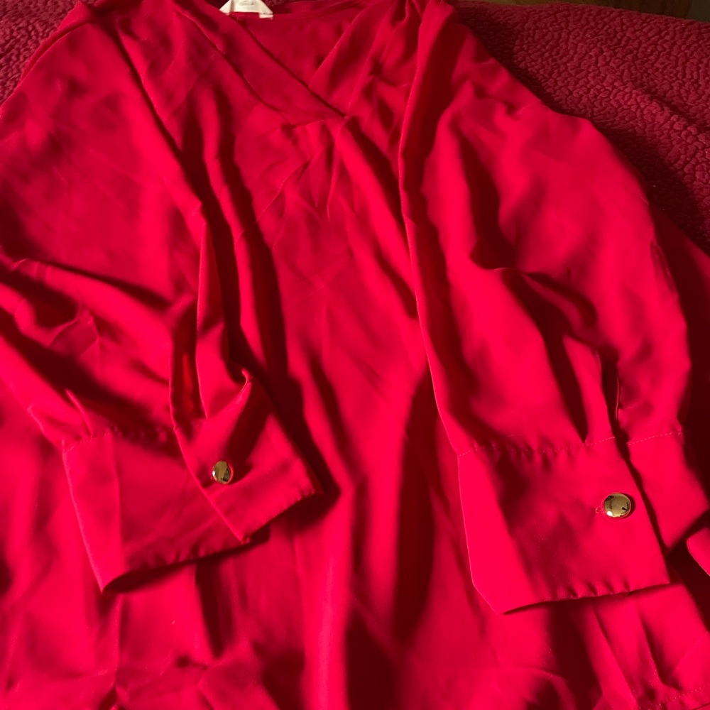 Woman’s red long sleeve blouse. Great for Christmas , Valentine’s Day.